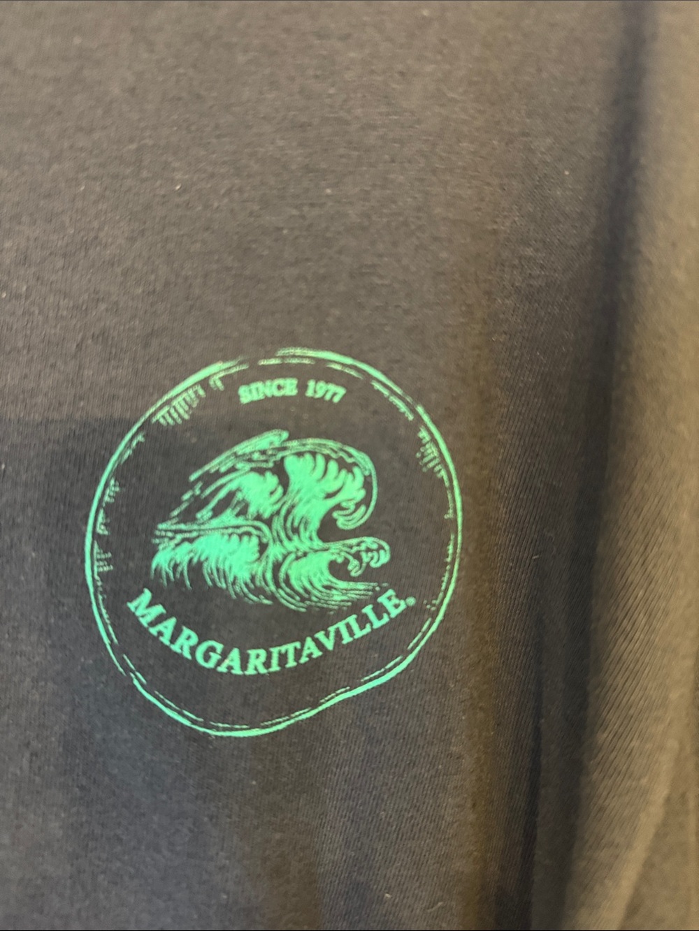 Margaritaville Blue Short Sleeve Tee with Green Wave Emblem